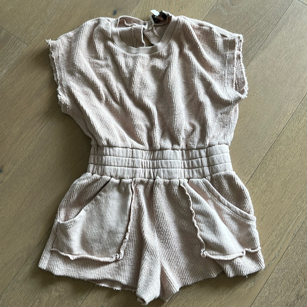 Cute romper with open back. EUC.